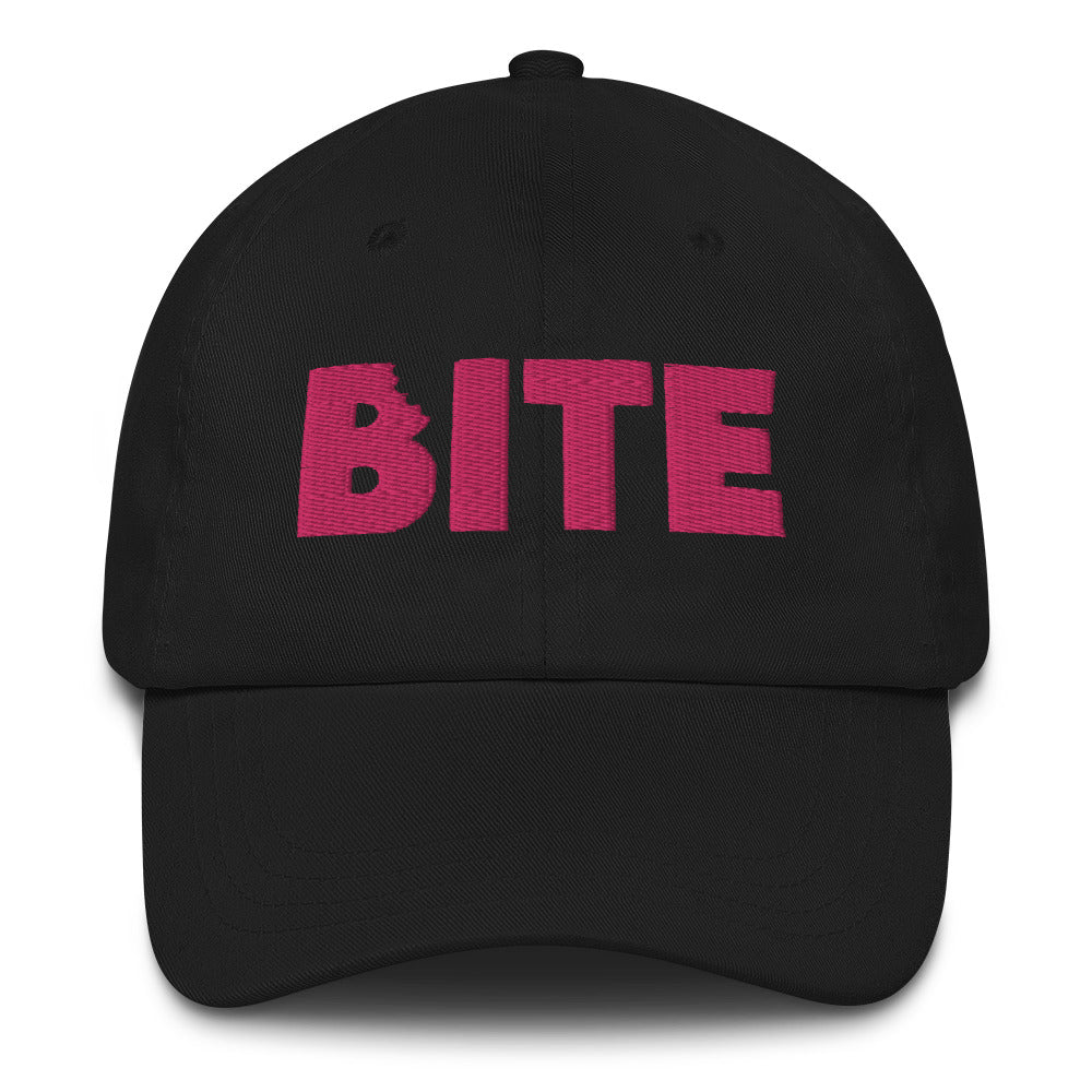 Black baseball hat with pink lettering that says Bite